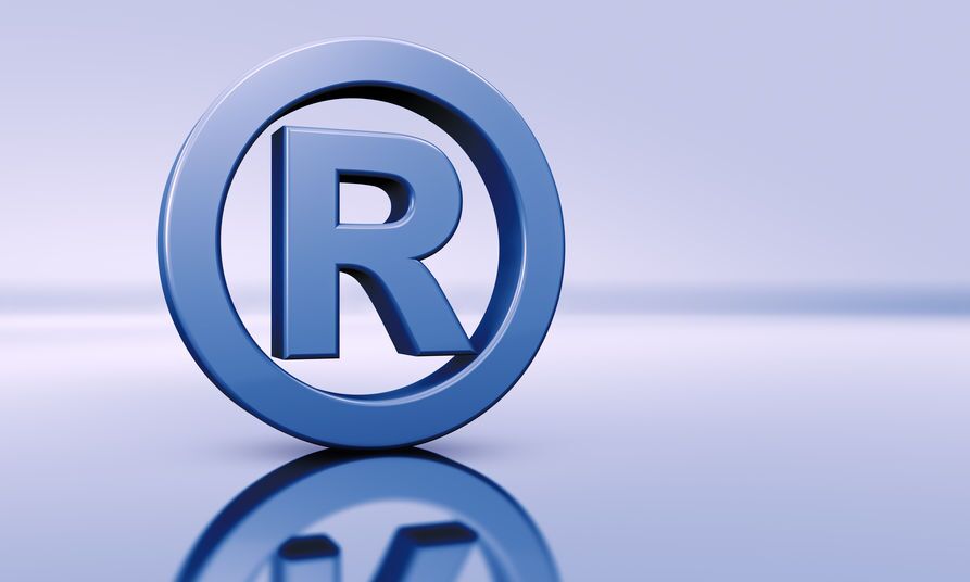 trademark symbol in blue circle